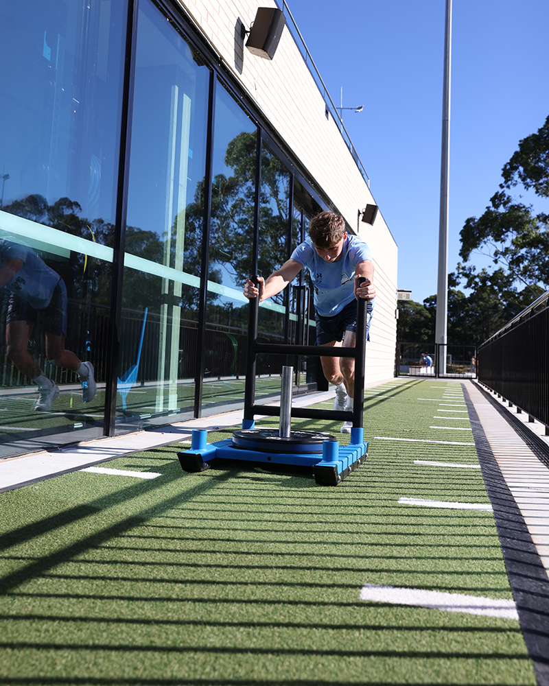 Sydney FC player training with AlphaFit sled